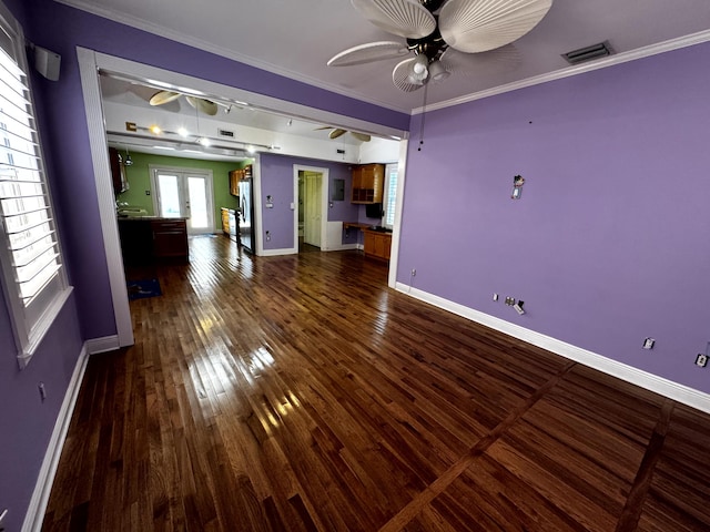 318 Margaret St, Key West, FL 33040 - unfurnished living room featuring a ceiling fan, baseboards, ornamental molding, and dark wood finished floors