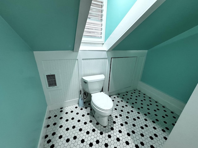 318 Margaret St, Key West, FL 33040 - bathroom featuring toilet, baseboards, and tile patterned floors