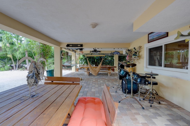 view of patio with ceiling fan