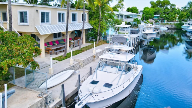 dock area featuring a water view