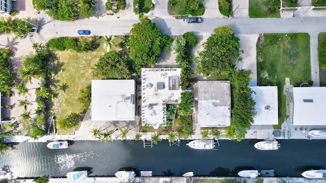 bird's eye view with a water view