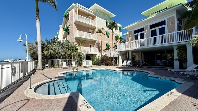 view of pool featuring a patio area