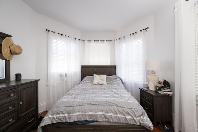 bedroom featuring baseboards