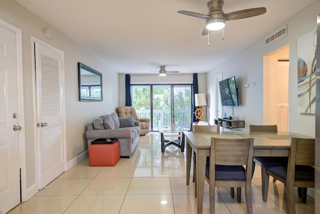 3314 Northside Dr Unit 31, Key West, FL 33040 - dining room with ceiling fan, light tile patterned floors, and baseboards