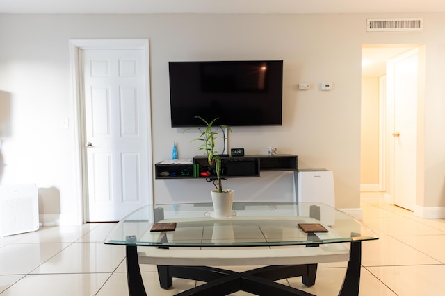 3314 Northside Dr Unit 31, Key West, FL 33040 - dining area with light tile patterned floors and baseboards
