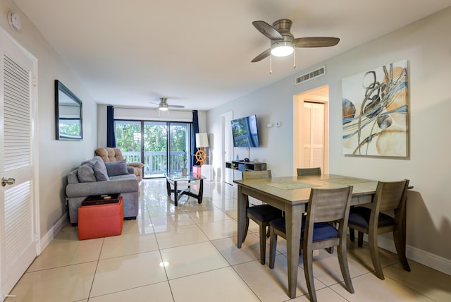 3314 Northside Dr Unit 31, Key West, FL 33040 - dining space with a ceiling fan, baseboards, and light tile patterned flooring