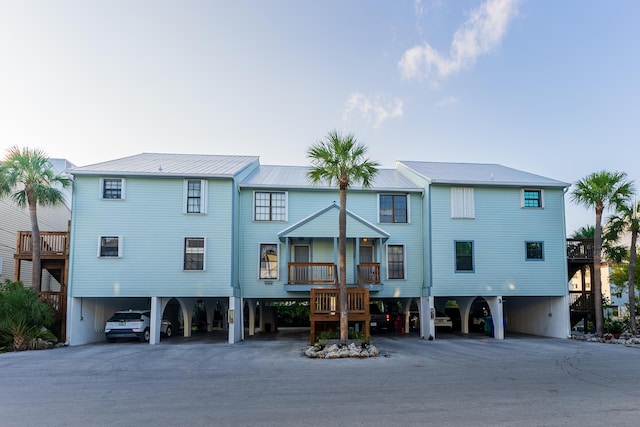 3314 Northside Dr Unit 31, Key West, FL 33040 - back of property featuring a carport and metal roof