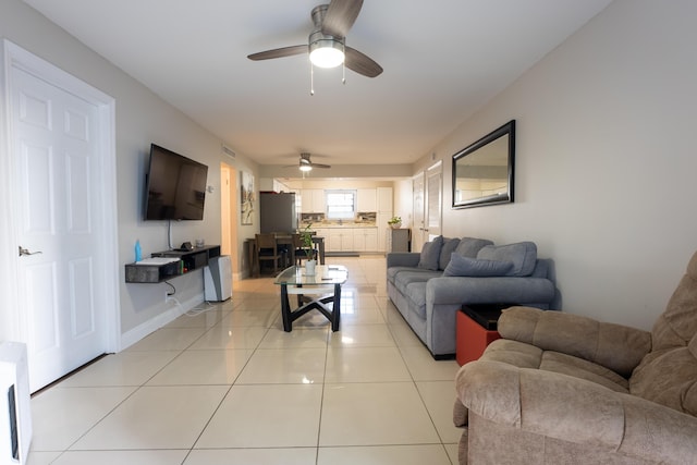 3314 Northside Dr Unit 31, Key West, FL 33040 - living area featuring ceiling fan, light tile patterned flooring, and baseboards