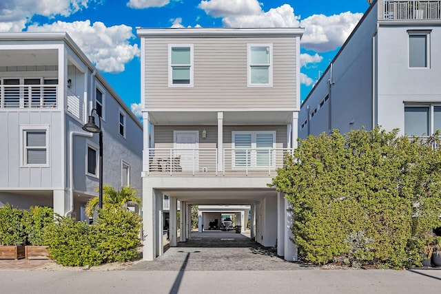 view of front of house featuring a balcony