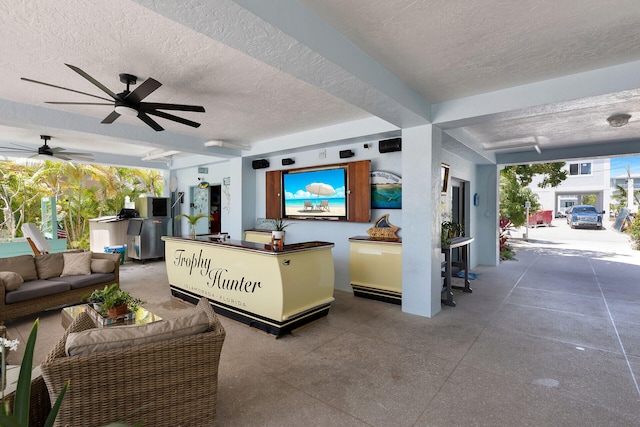 living room with a textured ceiling