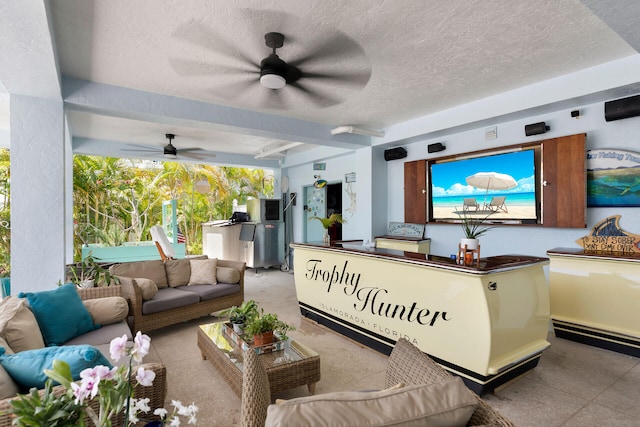 welcome area featuring ceiling fan