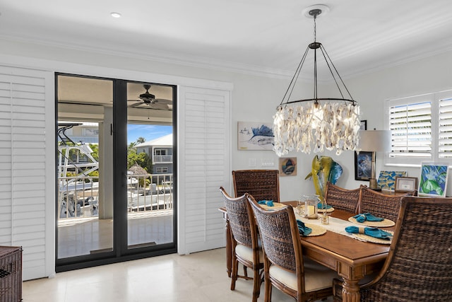 dining area featuring ornamental molding, plenty of natural light, and ceiling fan