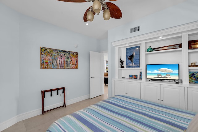 tiled bedroom with ceiling fan