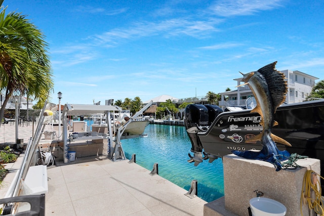 dock area featuring a water view