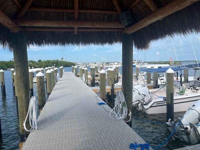 dock area featuring a gazebo and a water view