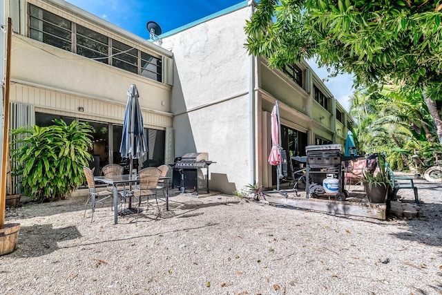 rear view of property with a patio area