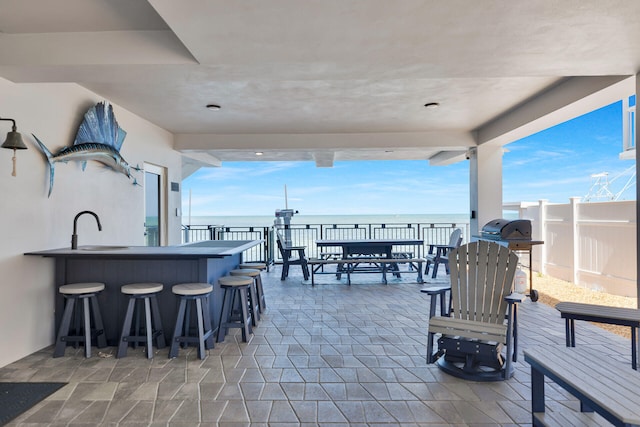 257 Normandy Dr, Tavernier, FL 33070 - view of patio / terrace featuring a water view