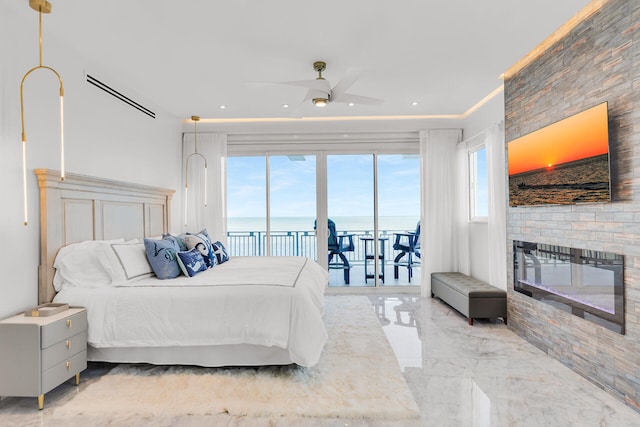 257 Normandy Dr, Tavernier, FL 33070 - bedroom featuring access to outside, marble tiled floors, a large fireplace, recessed lighting, and ceiling fan