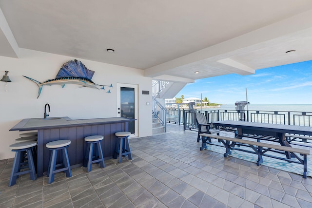 257 Normandy Dr, Tavernier, FL 33070 - view of patio with a water view