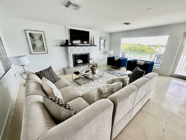 living room featuring a fireplace