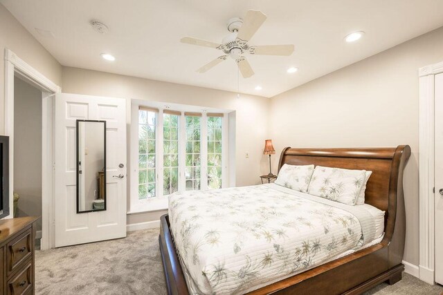 202 Admirals Ln, Key West, FL 33040 - bedroom with light colored carpet, recessed lighting, baseboards, a ceiling fan, and access to outside