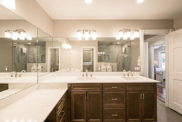 202 Admirals Ln, Key West, FL 33040 - full bathroom with a marble finish shower, double vanity, tile patterned flooring, and recessed lighting