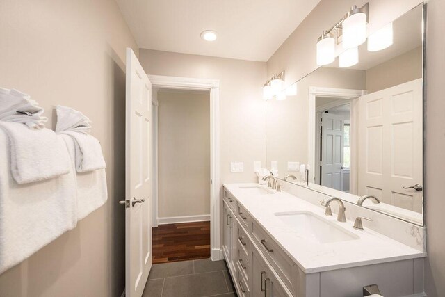 202 Admirals Ln, Key West, FL 33040 - bathroom with tile patterned flooring, double vanity, baseboards, and recessed lighting