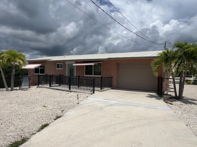 view of front of home featuring a garage