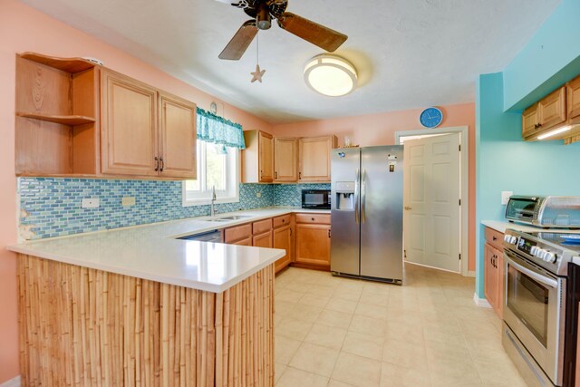 kitchen with light brown cabinetry, sink, backsplash, kitchen peninsula, and stainless steel appliances