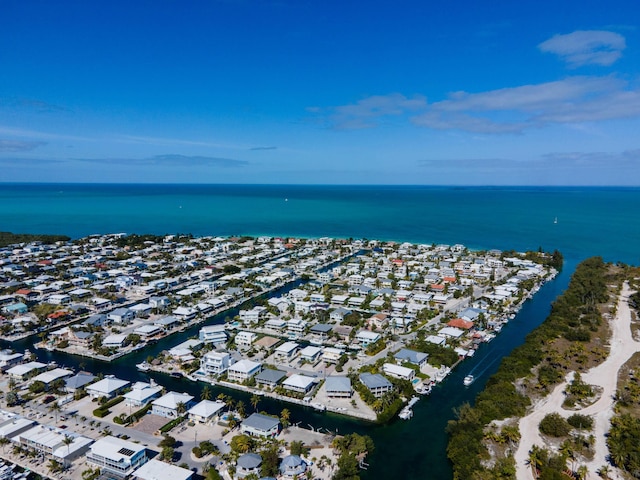 aerial view featuring a water view and a residential view