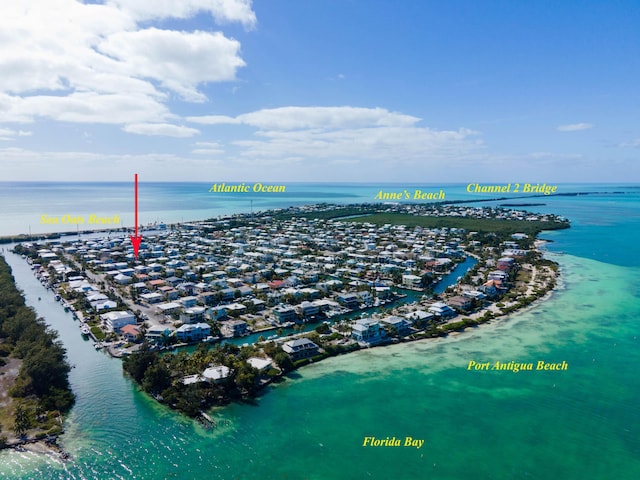 drone / aerial view featuring a water view