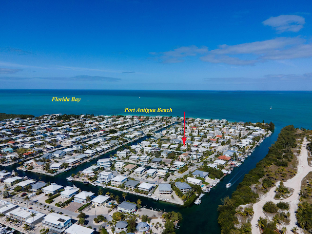 bird's eye view with a water view