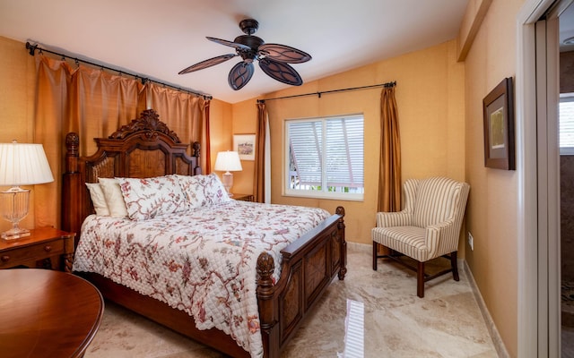 bedroom featuring vaulted ceiling and ceiling fan