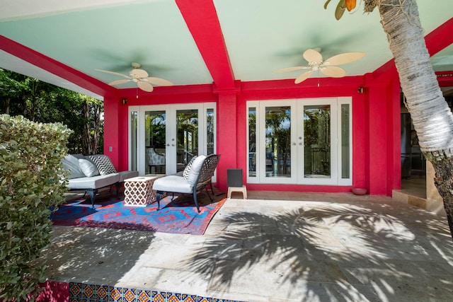 view of patio featuring french doors, ceiling fan, and an outdoor living space