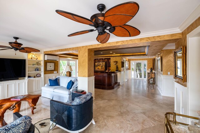 living room with ceiling fan, ornamental molding, a wall mounted AC, and built in features