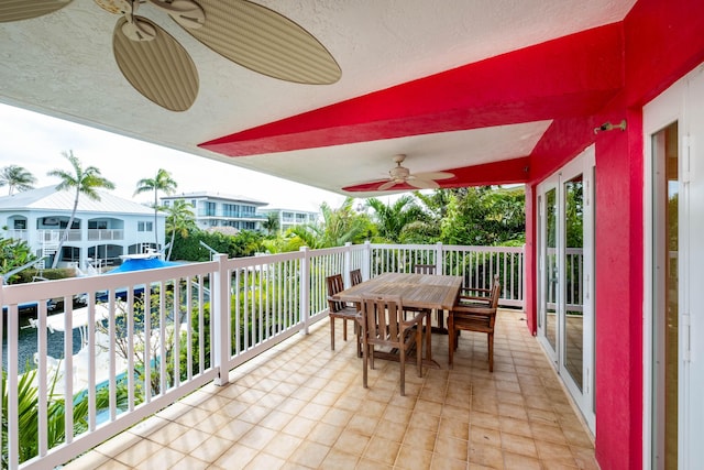 balcony featuring ceiling fan