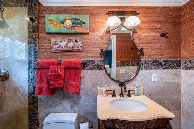 bathroom with vanity and tile walls