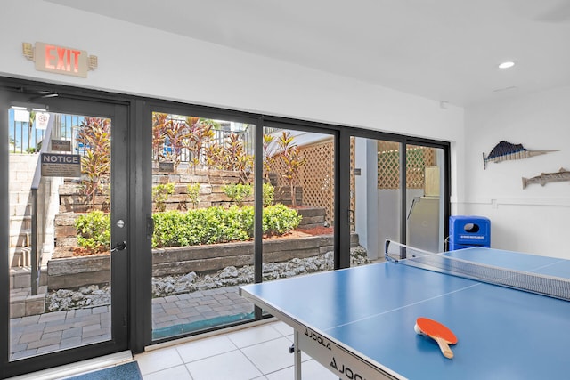 game room featuring light tile patterned flooring