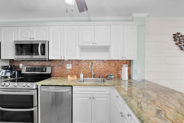 kitchen featuring white cabinetry, sink, and stainless steel appliances