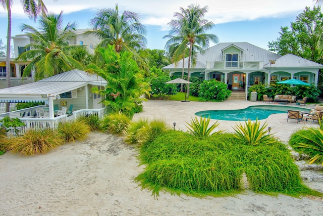 view of pool with an outdoor hangout area and a patio area