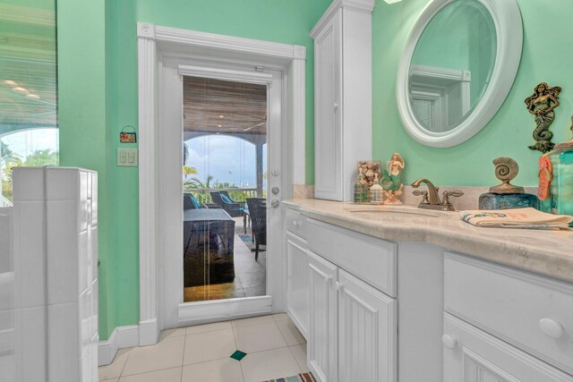 bathroom with vanity and tile patterned floors