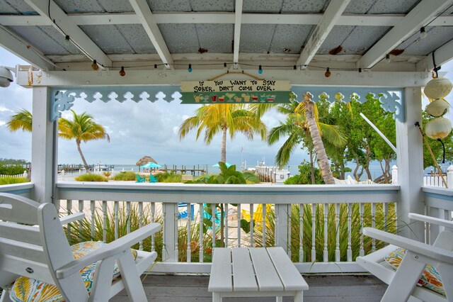 deck featuring a water view