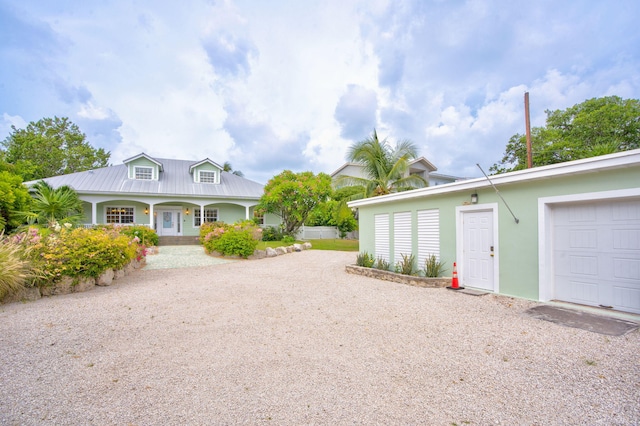 view of front of property with a garage