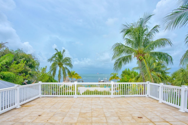 view of patio featuring a water view