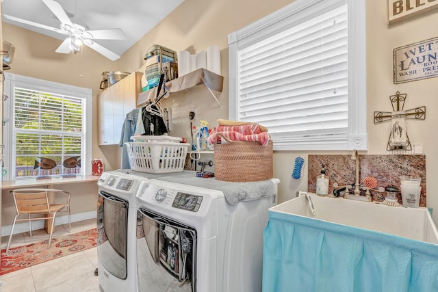 washroom featuring separate washer and dryer, light tile patterned floors, and ceiling fan