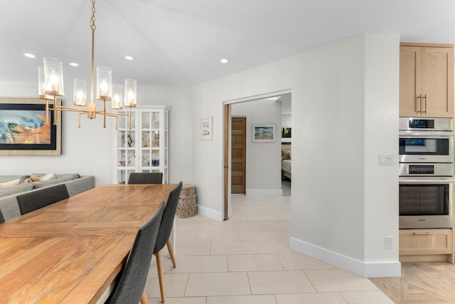 dining area with a chandelier