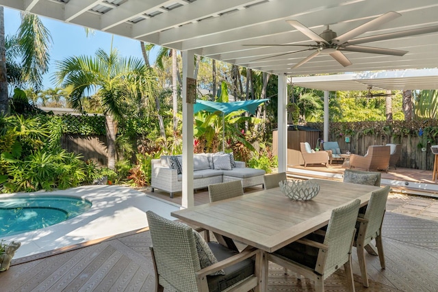 view of patio / terrace featuring a pergola, a swimming pool, outdoor lounge area, and ceiling fan