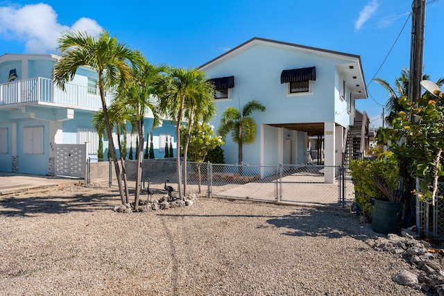 exterior space with a carport