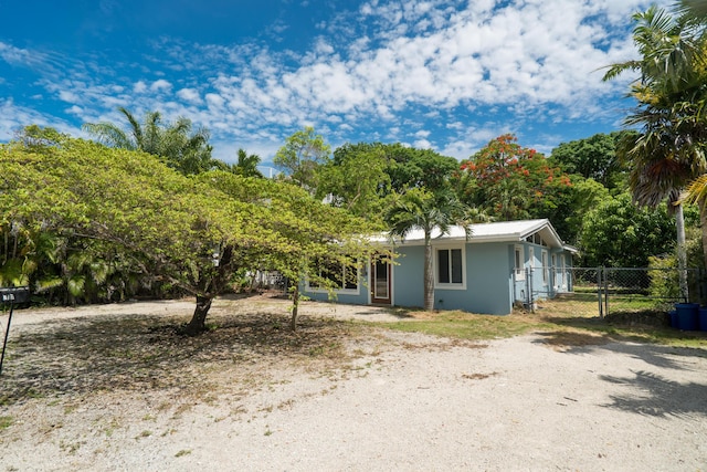 217 Gasparilla Dr, Key Largo, FL 33037 - view of front facade featuring a gate