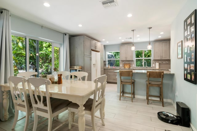 217 Gasparilla Dr, Key Largo, FL 33037 - dining space with recessed lighting and light wood finished floors